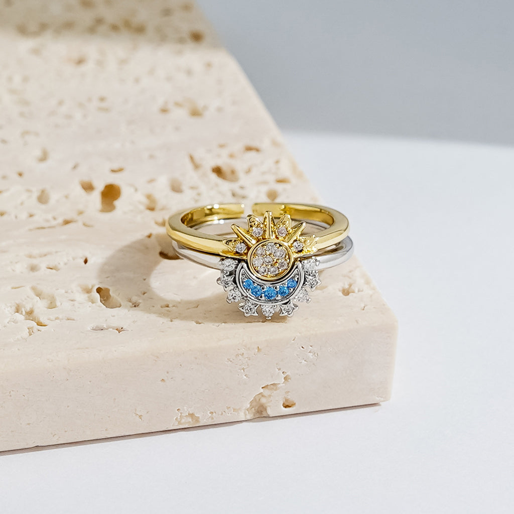 Ring with the sun and moon superimposed on it