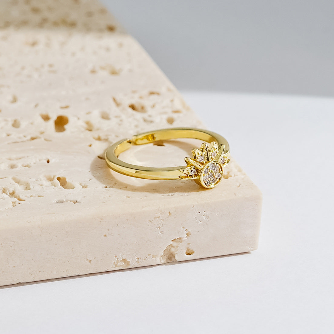 Ring with the sun and moon superimposed on it